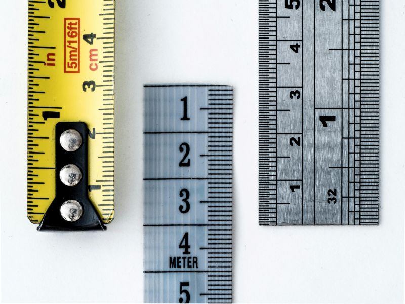 How do I convert millimeters to inches manually?